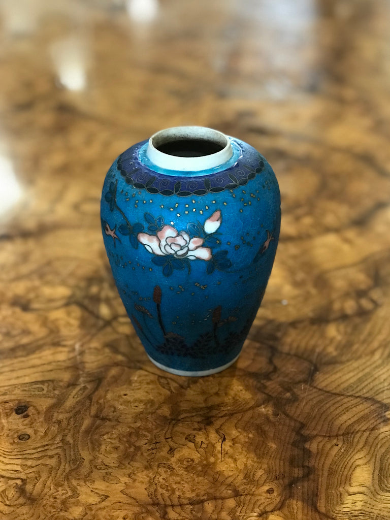 18th century blue Cloisonné vase found in Paris. The sweetest little l'objet, perfect atop a stack of books. Very thin hairline crack at mouth. Perfect for the vintage collector or an individual looking to achieve that luxurious, high-end look in their home.