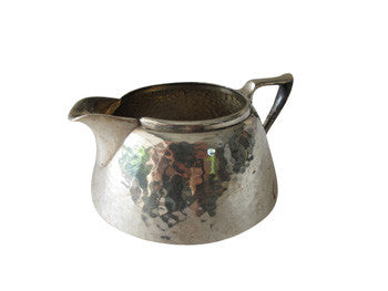 An antique set of Forbes Silver Co. silver-plated, hammered finish sugar bowl and creamer circa 1895. Creamer shown here.